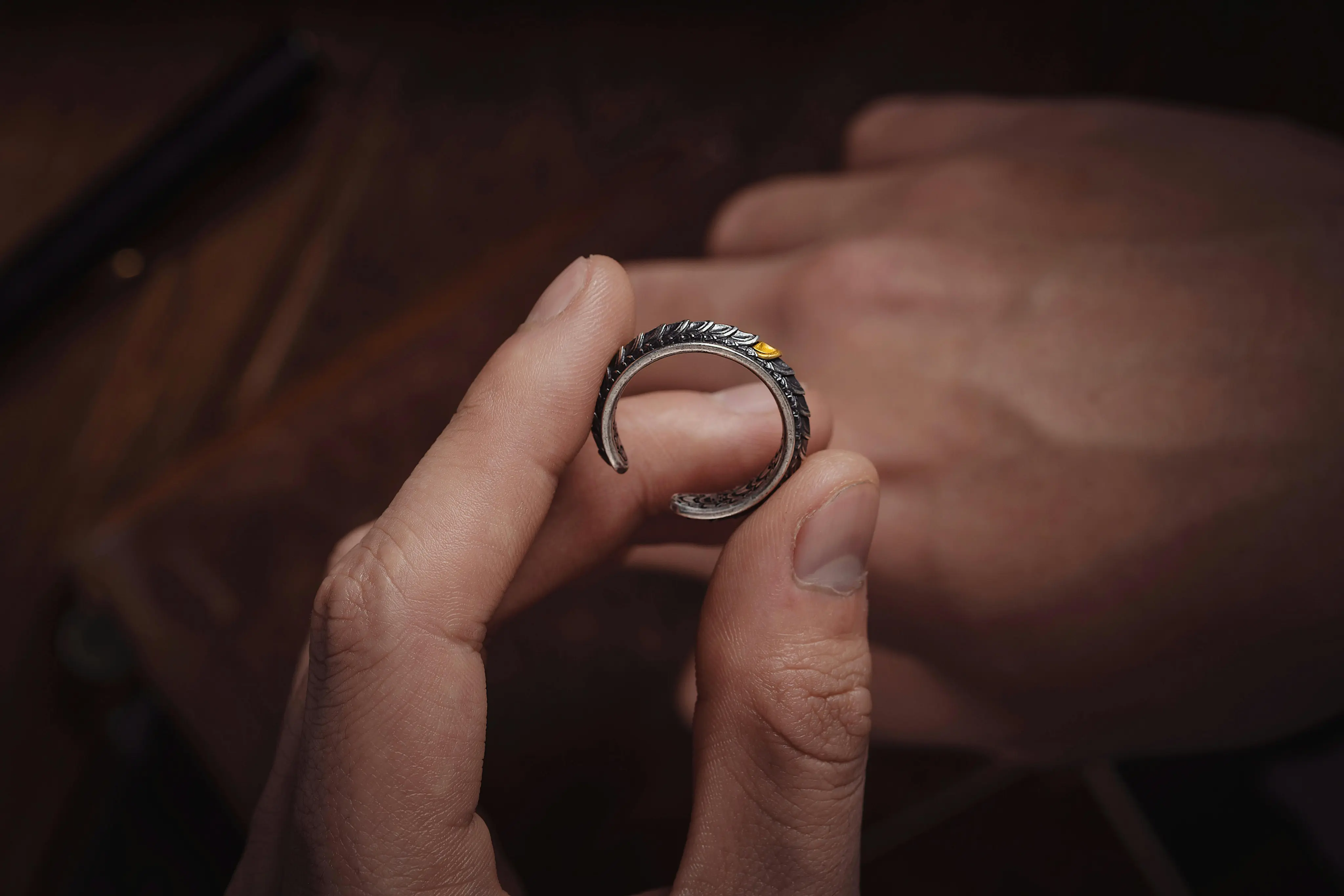 Finished handcrafted ring showcasing meticulous gemstone setting