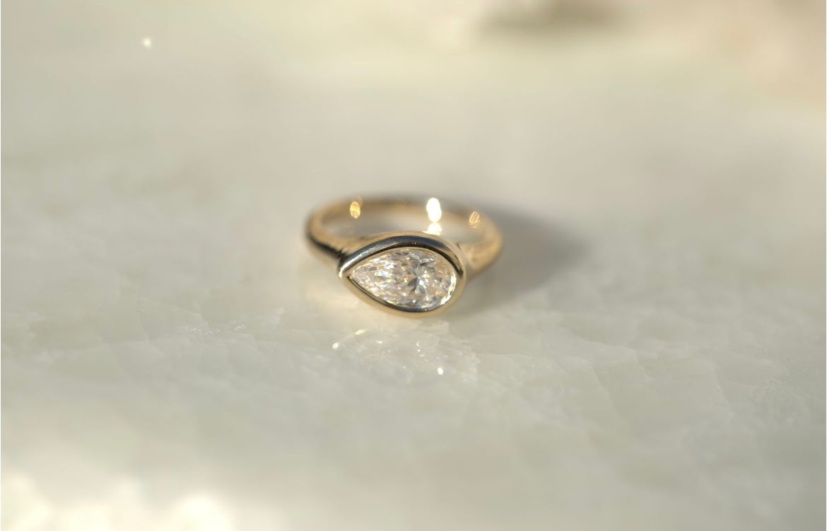 1.05CT Pear Lab Diamond Bezel Set East West