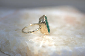 One-Of-A-Kind Colombian Emerald & Diamond Halo Ring