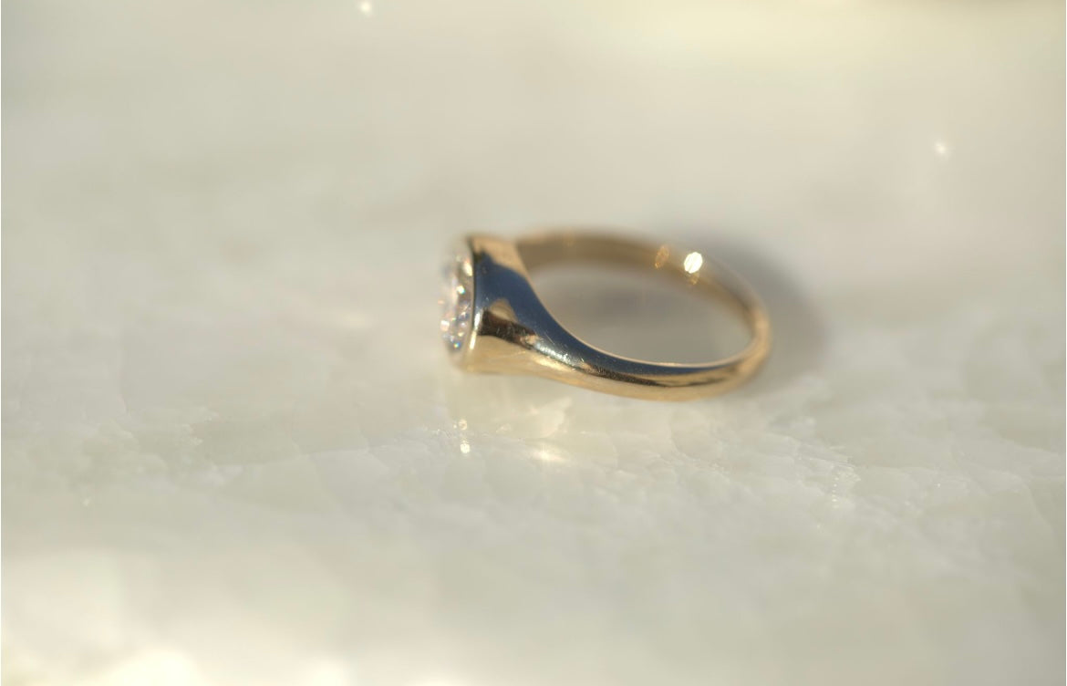 1.05CT Pear Lab Diamond Bezel Set East West